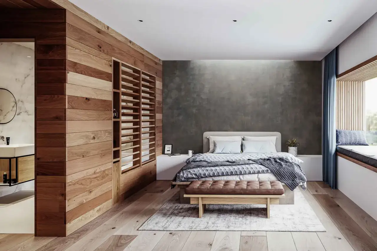 Dormitorio moderno con paredes falsas de madera para separar espacios. Cama, banco y ventana con cojines.