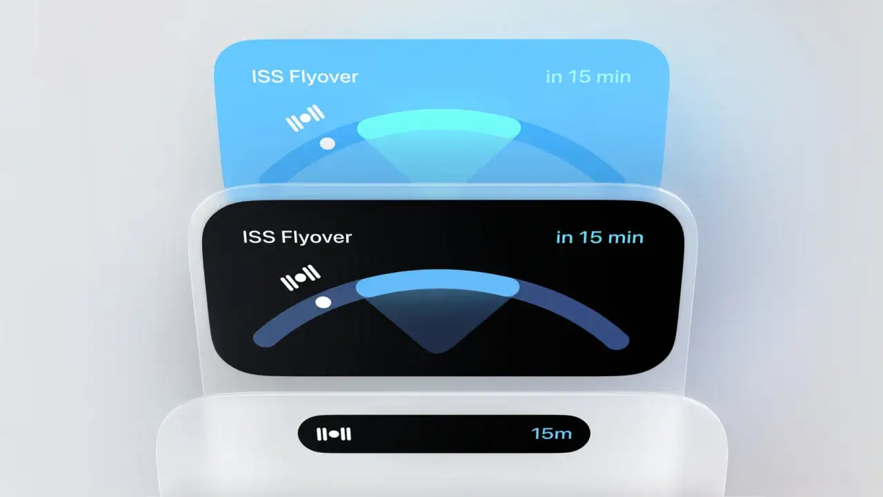 Interfejs z powiadomieniem o przelocie ISS za 15 minut. Widoczny element dynamic island.
