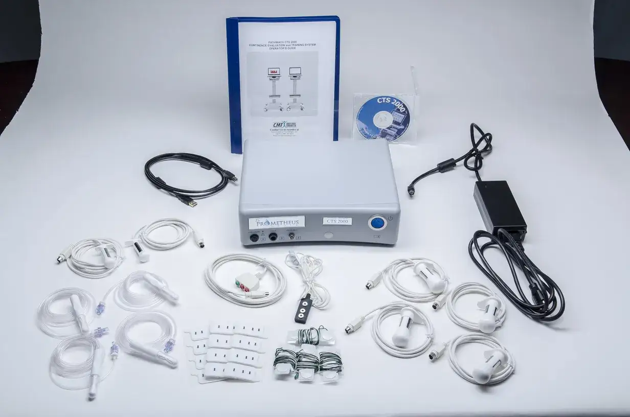 Ensemble pour rééducation périnée sonde : appareil CTS 2000, câbles, électrodes, manuel et CD.