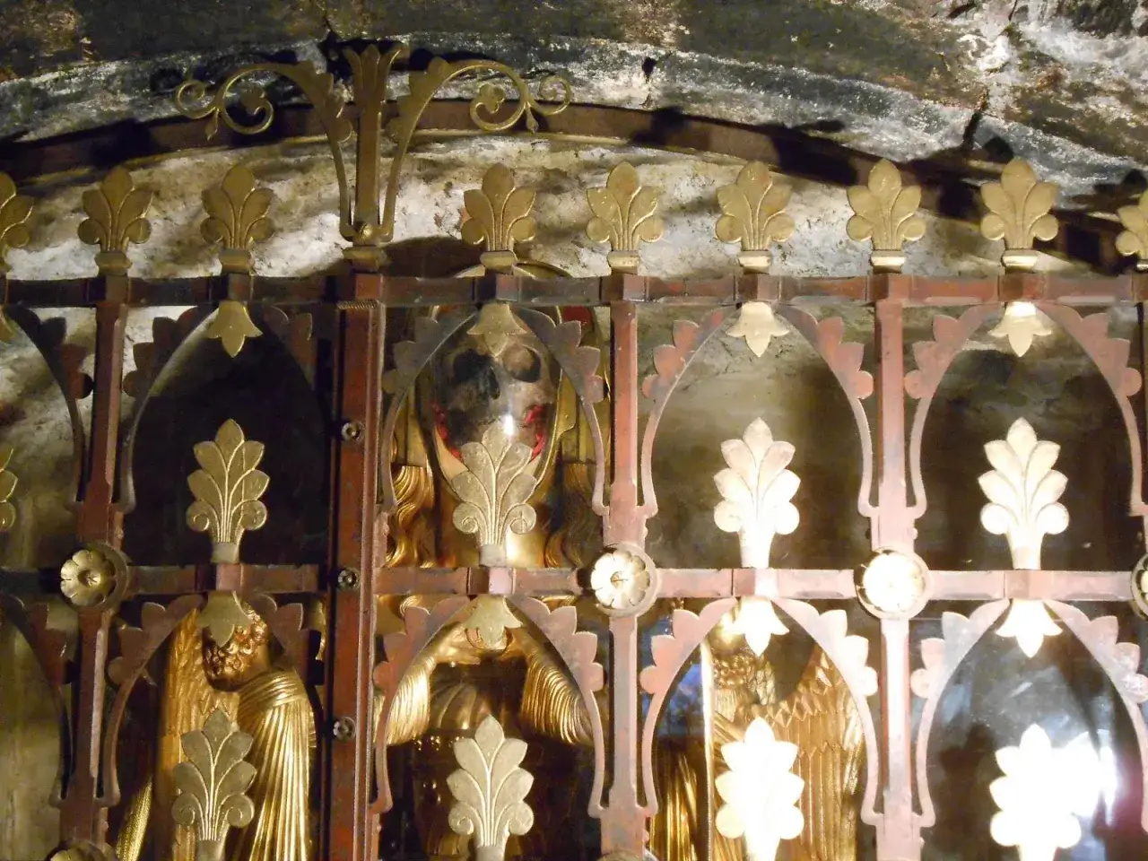 A reliquary containing a skull, possibly of Mary Magdalene, behind a decorative metal screen in the basilica.
