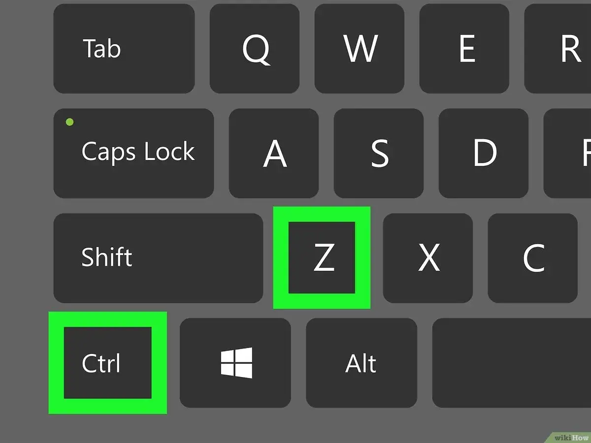 Teclado con teclas Ctrl y Z resaltadas en verde, indicando la acción de copiar y pegar.