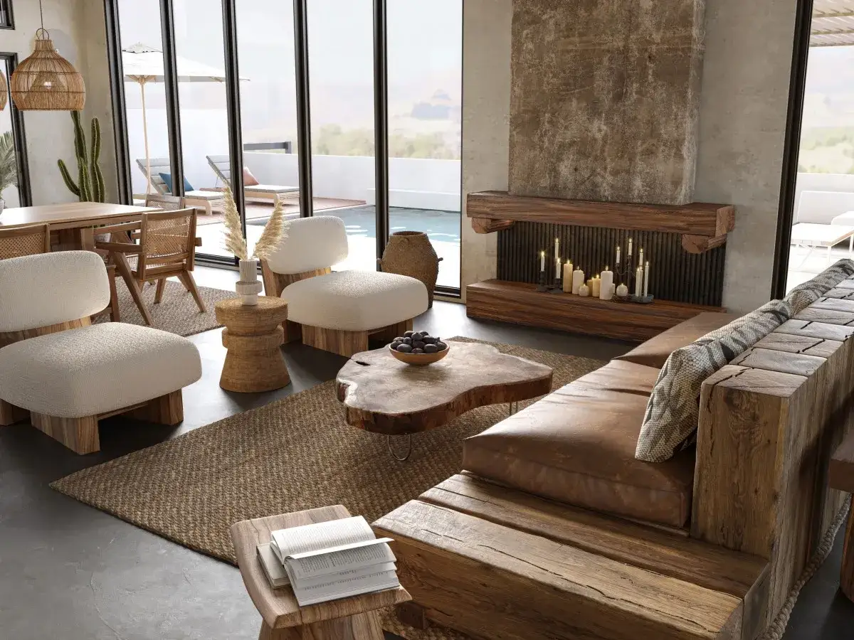 Un acogedor sal&oacute;n wabi sabi con sof&aacute; de madera r&uacute;stica, chimenea de piedra y muebles de fibras naturales.