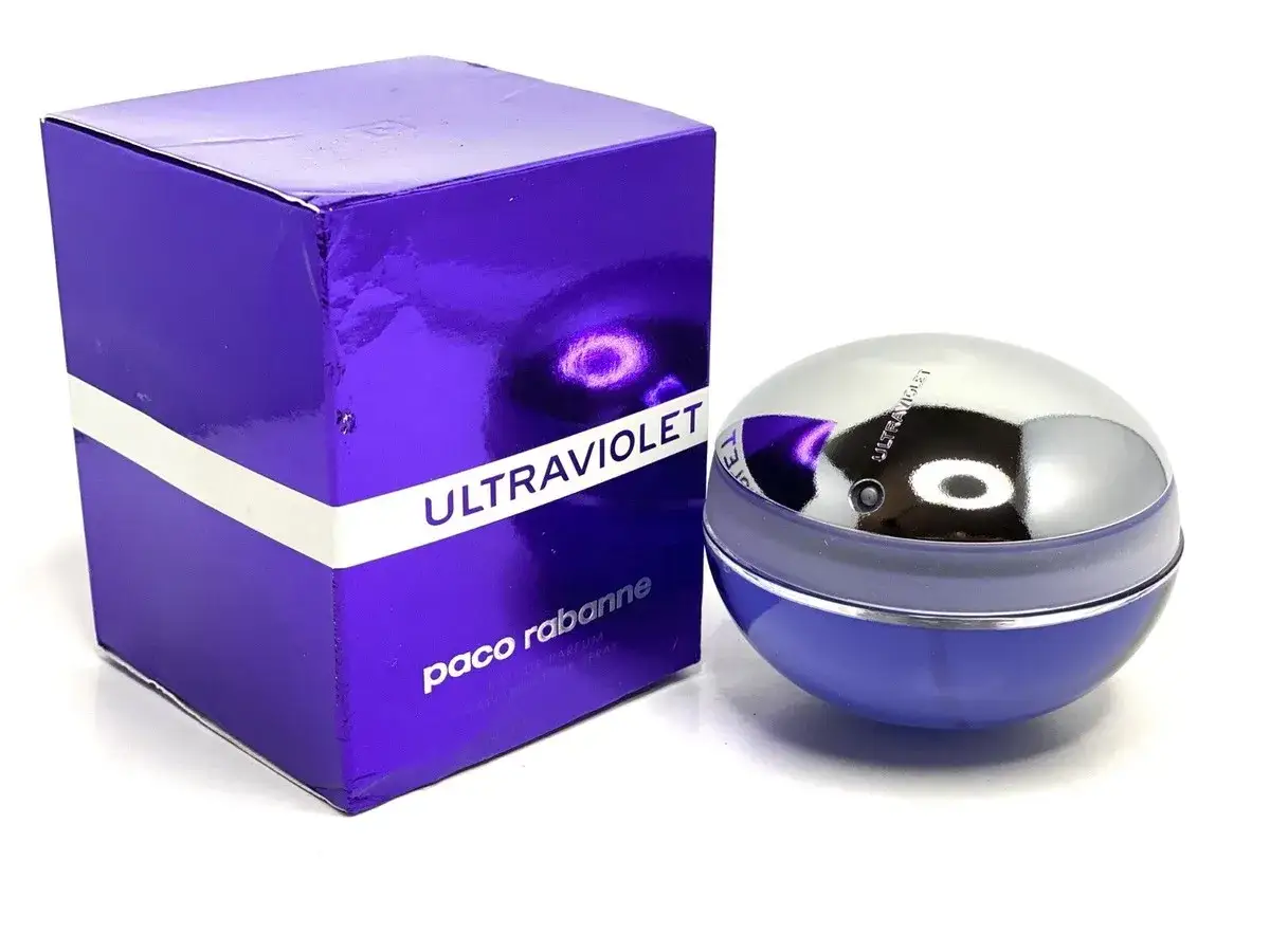 Paco Rabanne Ultraviolet – fioletowe pudełko i kulista butelka perfum, gotowe do odkrycia zmysłowego zapachu.