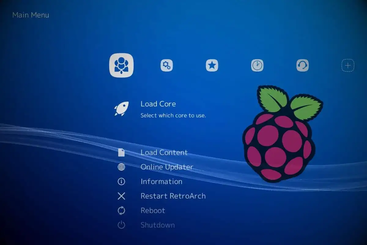 Menu główne Lakka OS. Widok menu z opcjami: Load Core, Load Content, Online Updater, Information, Restart RetroArch, Reboot, Shutdown. Po prawej stronie ikona maliny.