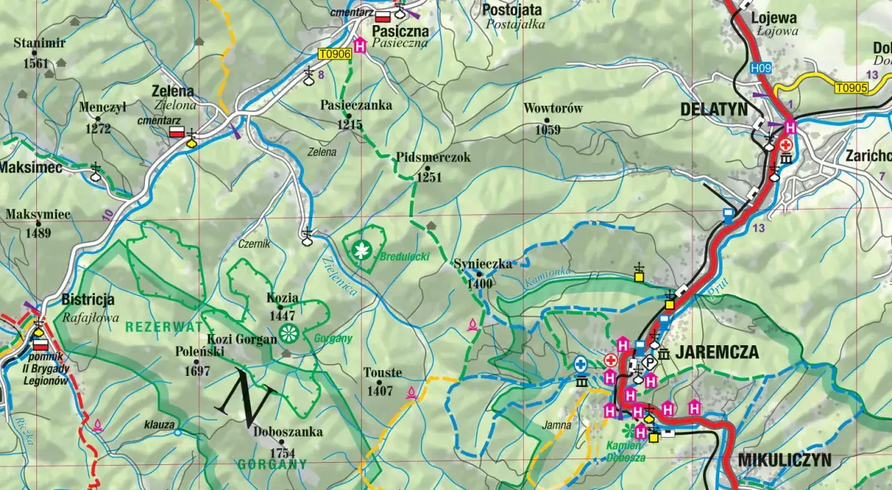 Fragment mapy **Karpaty Ukraina** z zaznaczonymi szlakami, miejscowościami (Delatyn, Jaremcza, Mikuliczyn) i szczytami.