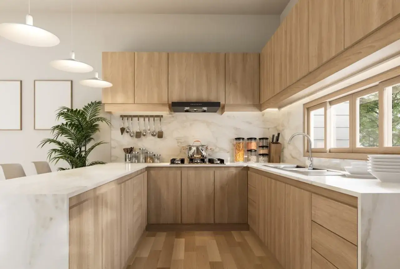 Cocina moderna con ventanal, gabinetes de madera clara y encimeras de mármol. Luminosa y espaciosa, ideal para crear.
