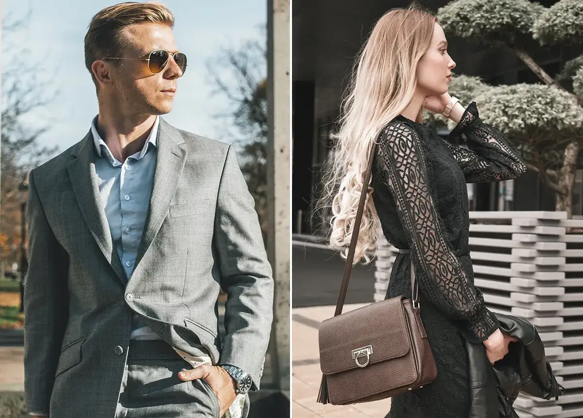 Elegancki mężczyzna w garniturze i kobieta w czarnej sukience, oboje w stylu francuskim, pozują na tle miejskiego krajobrazu.