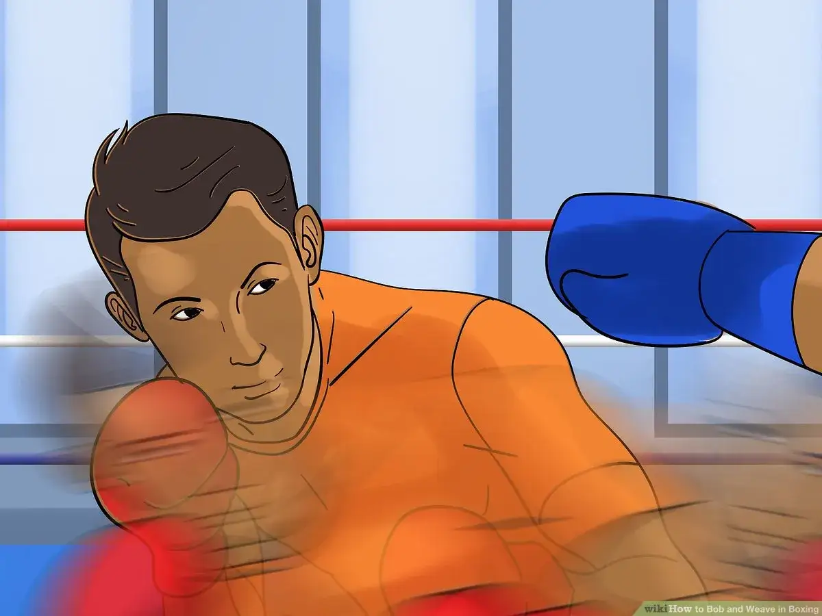 Boxer in orange shirt dodges a blue-gloved punch with a bob and weave motion in a boxing ring.