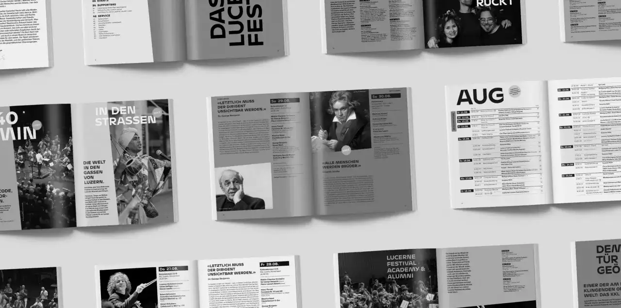Ejemplos de dise&ntilde;o gr&aacute;fico: programa de festival con fotos de m&uacute;sicos y artistas, tipograf&iacute;a audaz y dise&ntilde;o de p&aacute;gina atractivo.