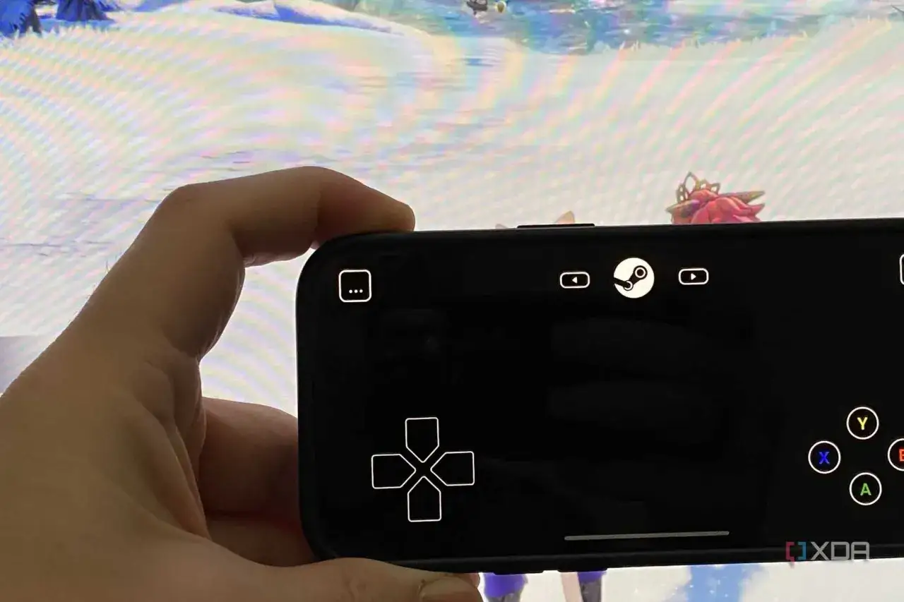 Telefon z ikoną Steam, pokazujący, czy można grać w gry ze Steam na telefonie. Wirtualny kontroler na ekranie.