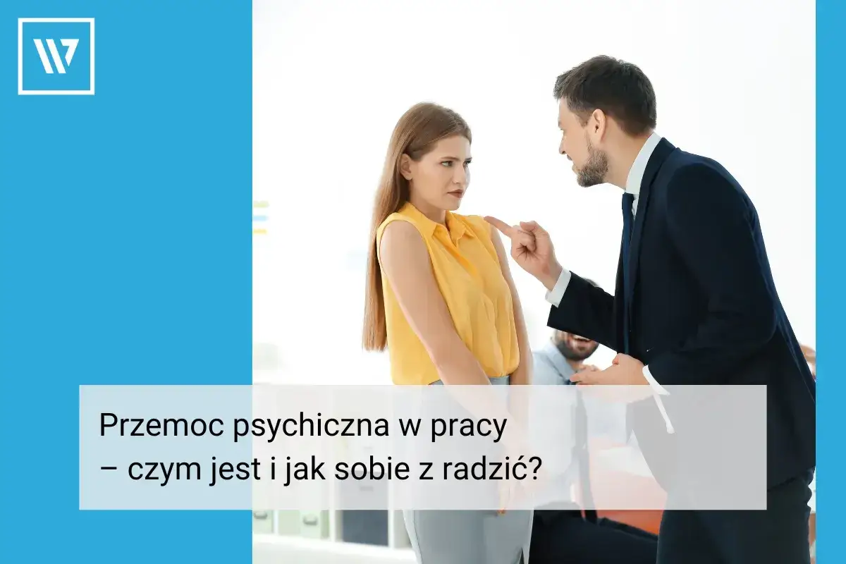 Mężczyzna w garniturze grozi kobiecie palcem, sugerując mobbing w pracy.
