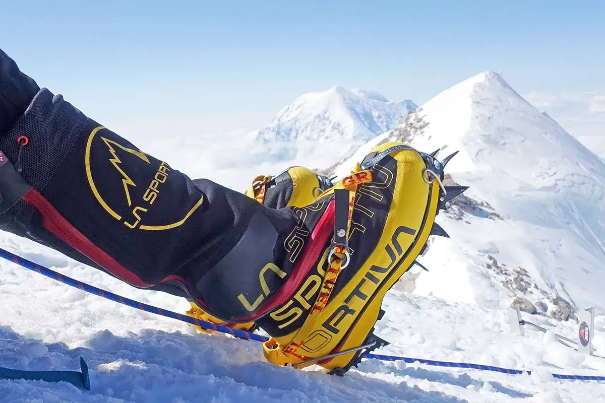 Properly fitting mountaineering boots with crampons is key for icy ascents. These La Sportiva boots are ready for the summit.