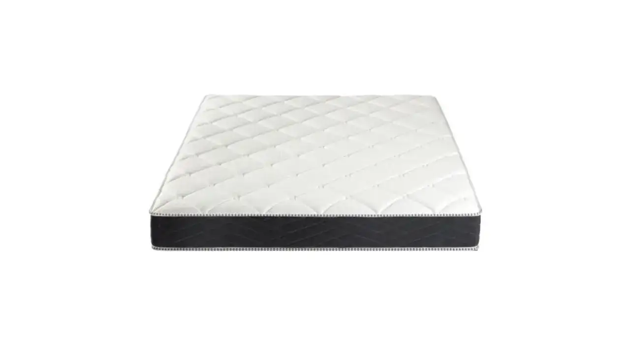 Matelas Bultex : ses avantages et inconvénients. Un matelas blanc matelassé avec une bande noire sur le côté.