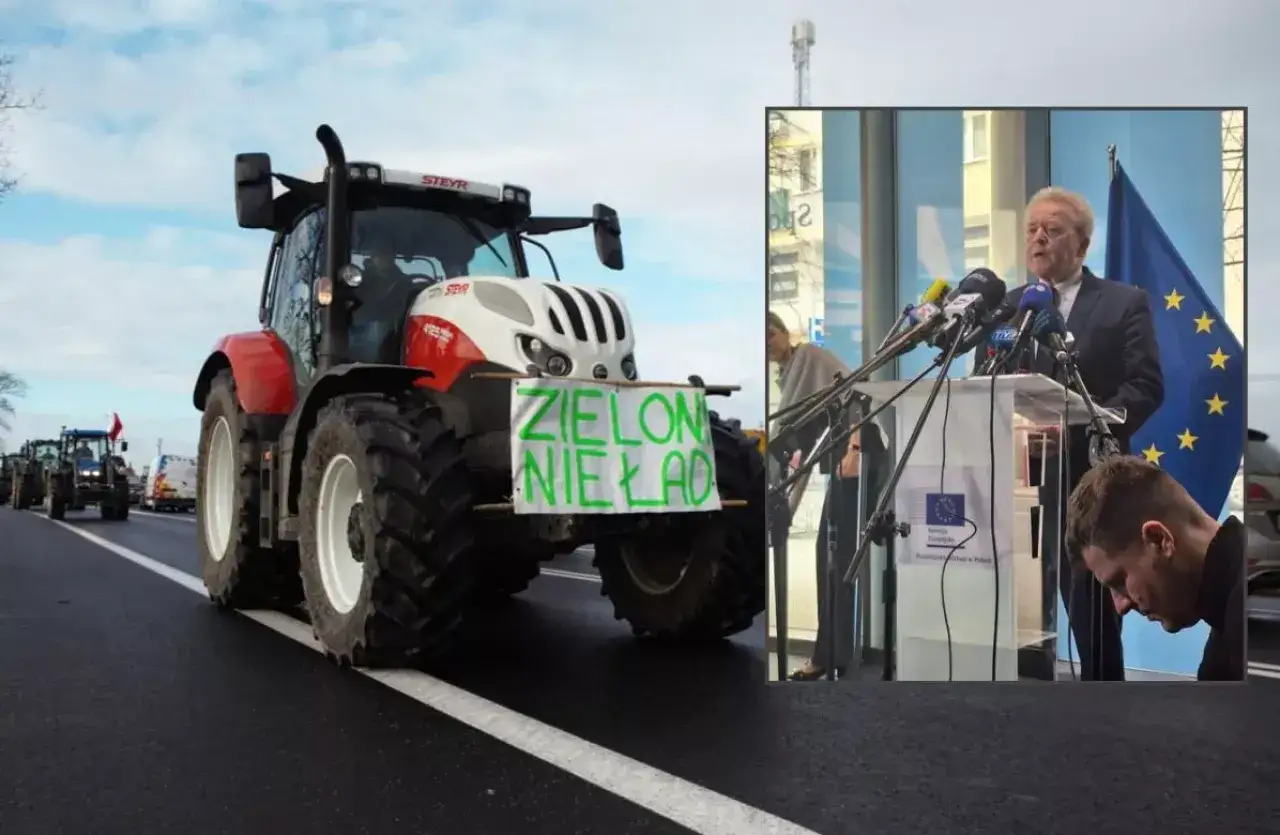 Traktory na drodze z transparentem 