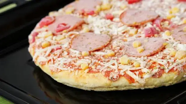Zdjęcie Jak idealnie piec pizzę Guseppe, aby uniknąć przypalenia?