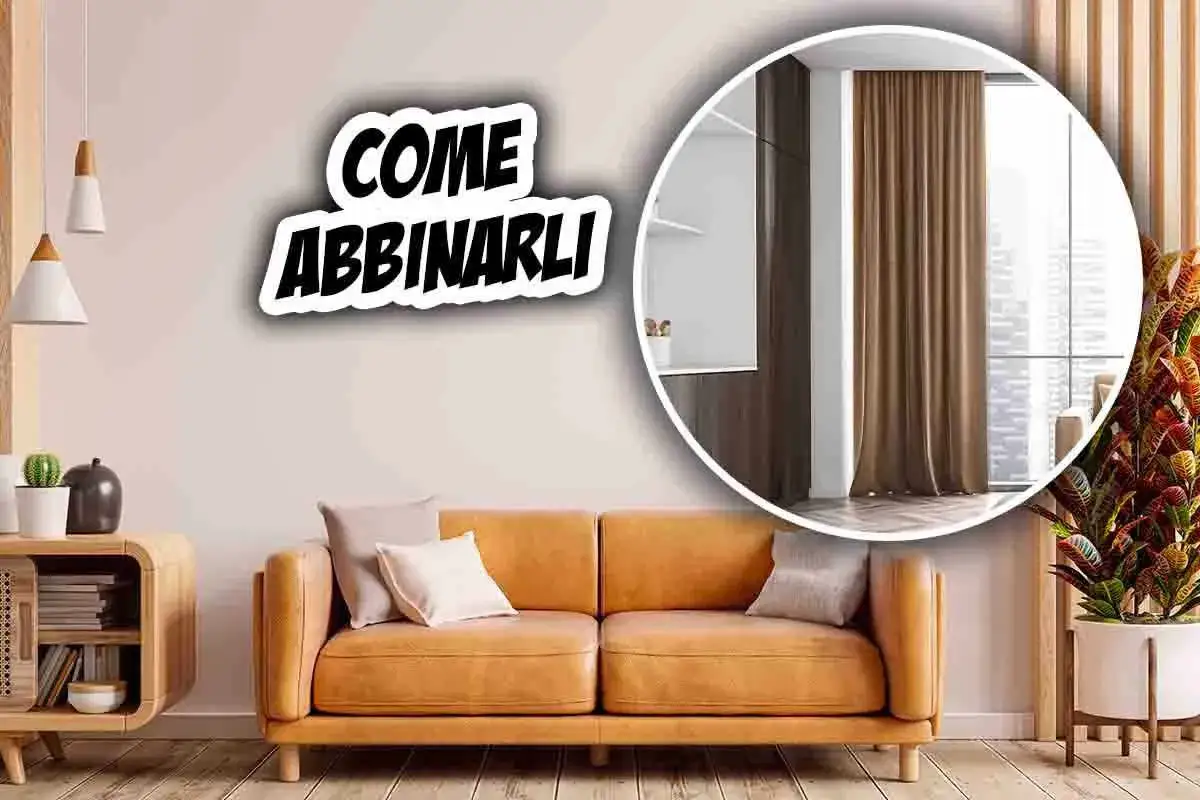 Come abbinare tende al divano: un soggiorno moderno con divano color cuoio, mobili in legno e tende marroni in un cerchio.