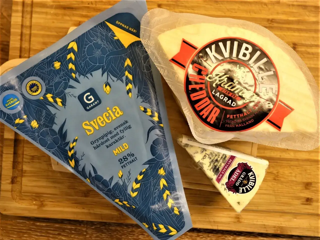 Tre svenska namn på ostar: Svecia, Kvibille Cheddar och Kvibille Ädel.