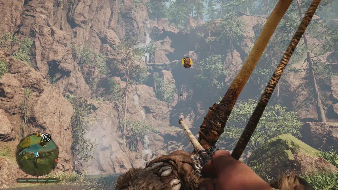 Gracz celuje z łuku w skalistej scenerii, szukając wskazówek w Far Cry Primal poradnik.