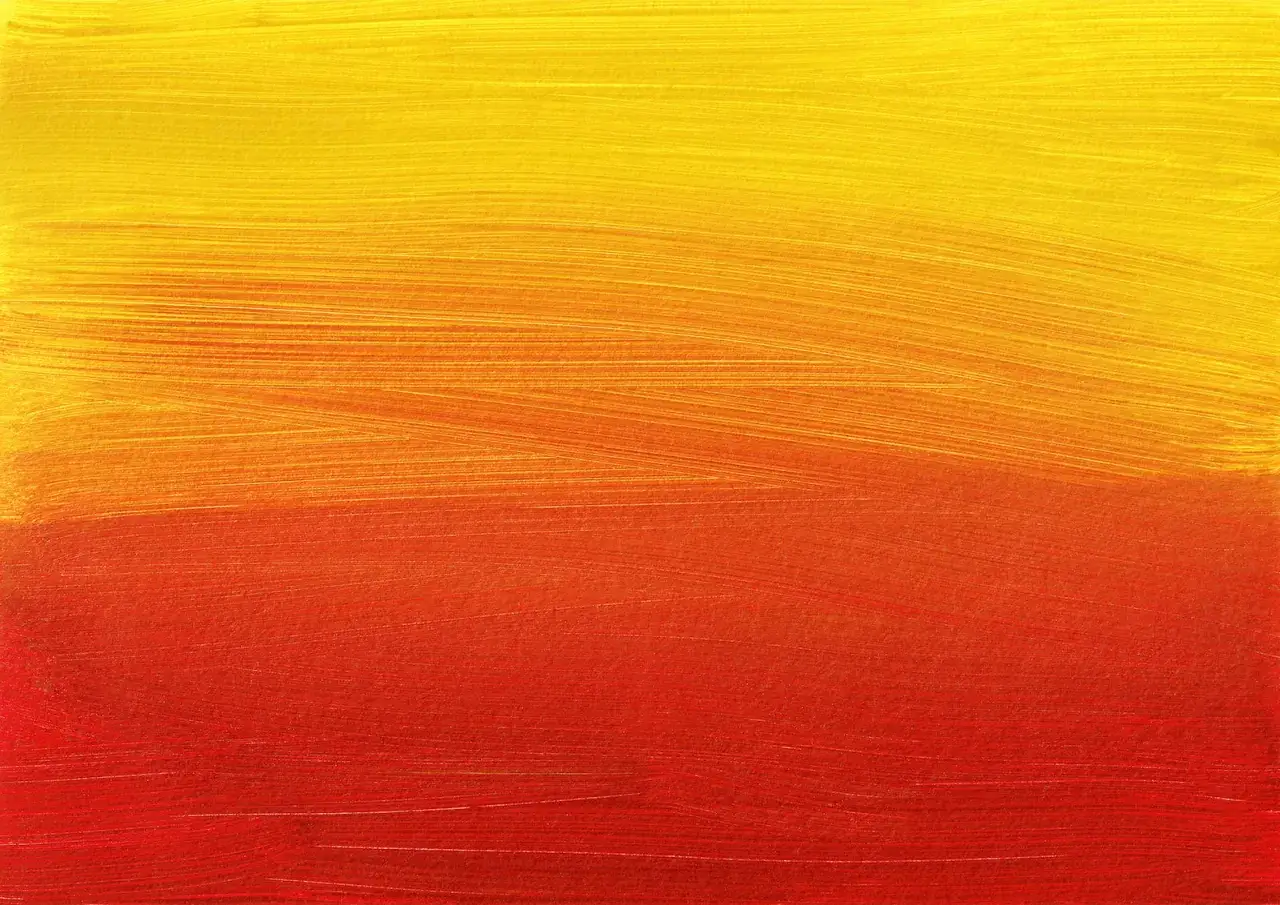 Farbverlauf von Gelb &uuml;ber Orange bis Rot. Die Pinselstriche sind deutlich sichtbar und erzeugen eine warme, lebendige Textur. Ein sch&ouml;nes Beispiel, wie man Farben mischen kann.