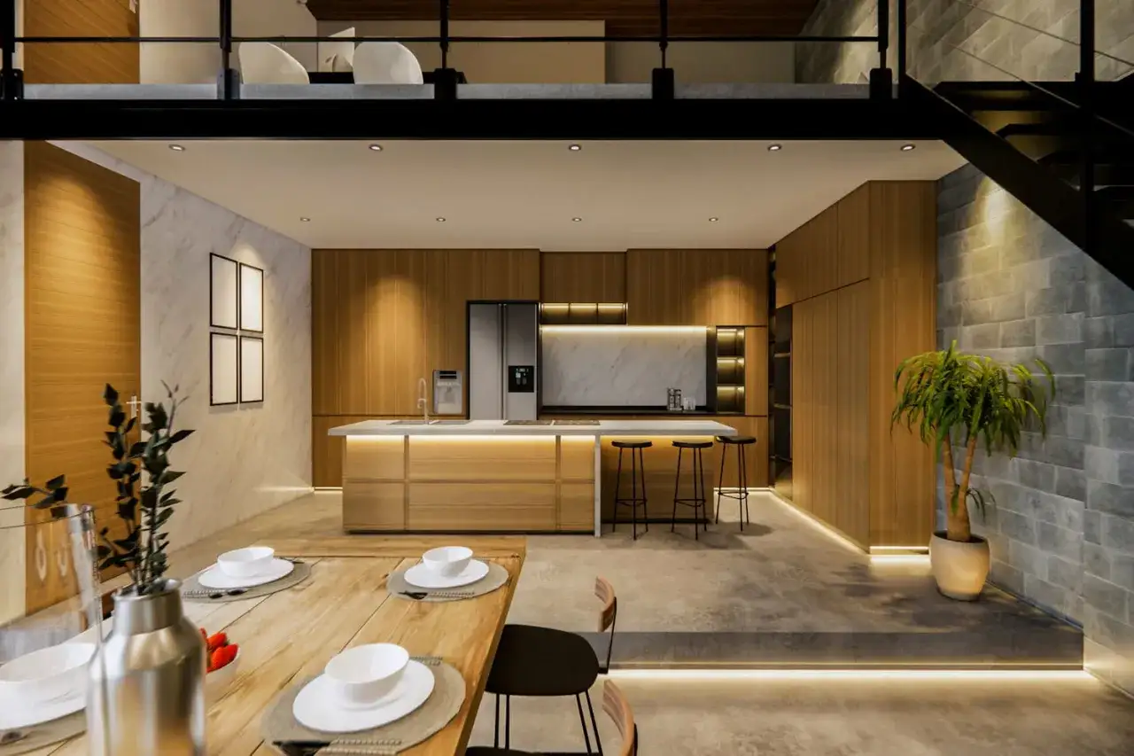 Cuisine moderne avec îlot central, escalier menant à un étage supérieur, style souplex.