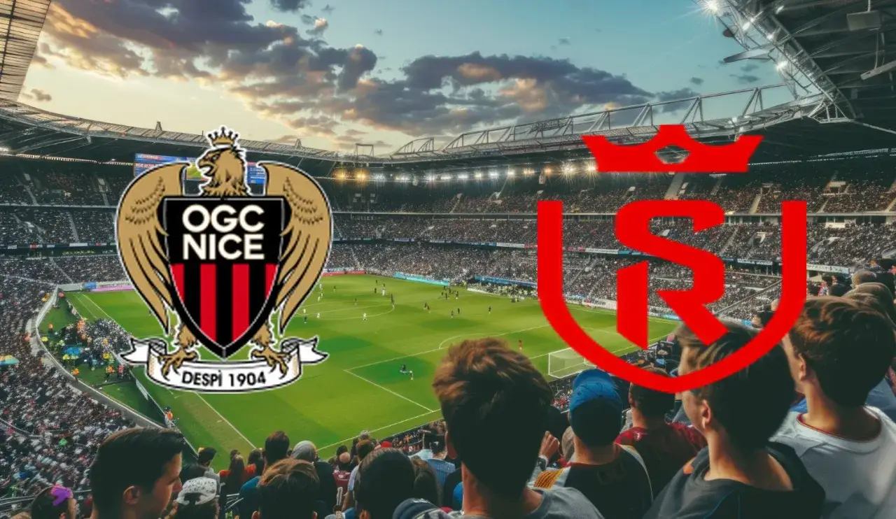 Stadion pełen kibiców, na murawie mecz. W tle loga OGC Nice i Stade de Reims.