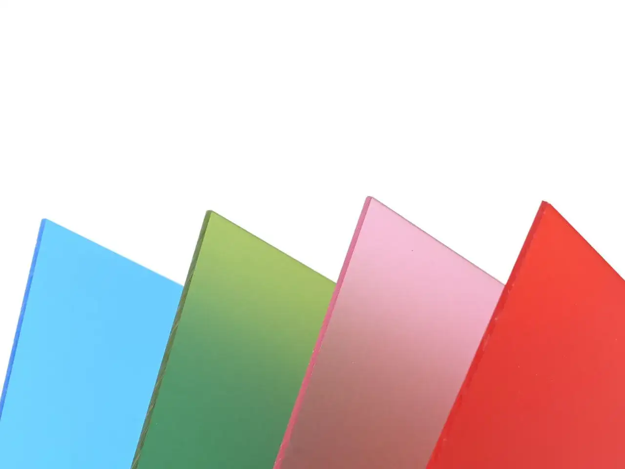 A spectrum of colored plexiglass sheets: blue, green, pink, and red, showcasing different types of plexiglass.