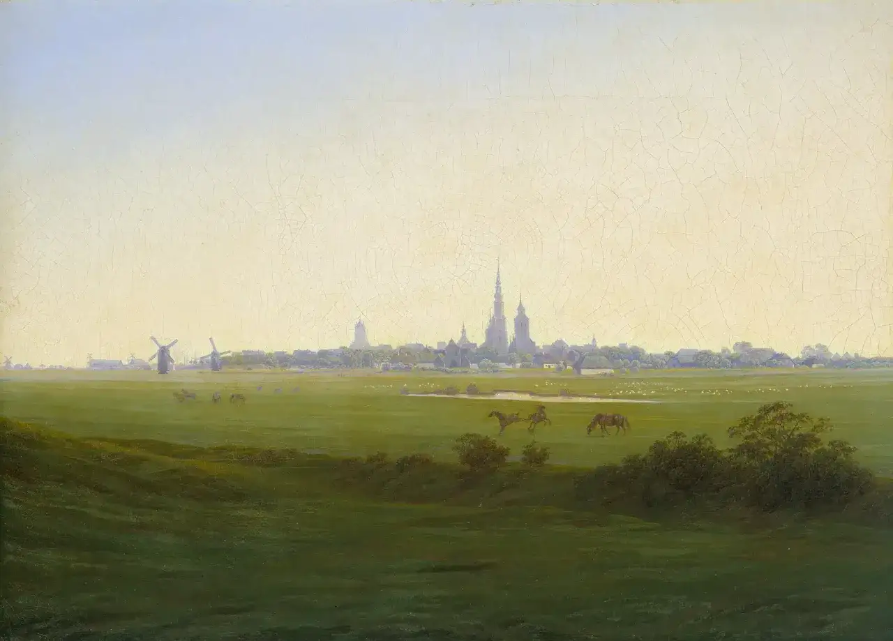Caspar David Friedrichs Blick auf Greifswald: Grüne Wiesen, Pferde und die Silhouette der Stadt im sanften Licht.