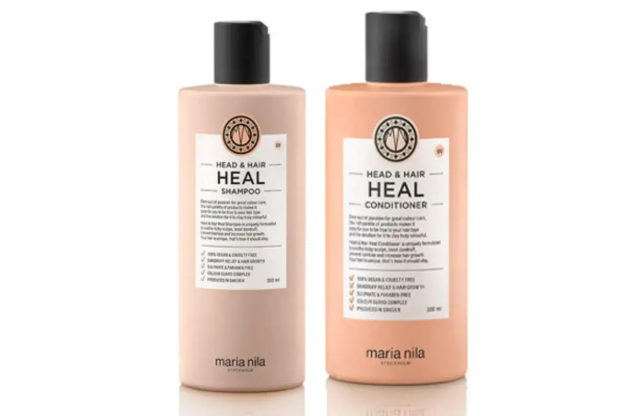 Två flaskor Maria Nila Heal, en för torrt hår. Schampo och balsam som ger näring och glans.