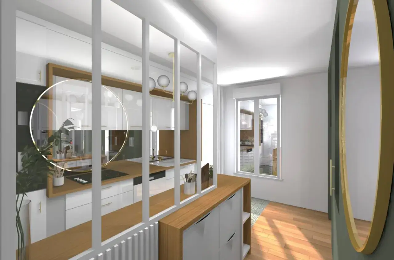 Aménagement entrée ouverte avec cuisine moderne, séparée par une verrière. Un grand miroir doré apporte une touche chic.