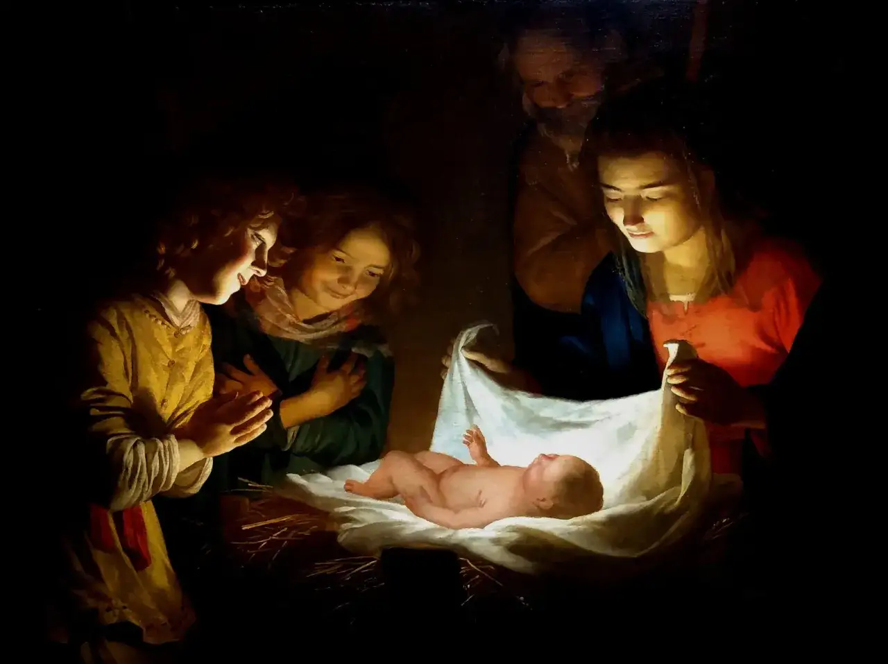 Une peinture en clair-obscur de la Nativité. La Vierge Marie, Joseph et deux enfants regardent avec émerveillement le bébé Jésus dans sa crèche.