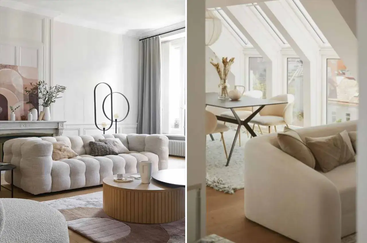 Un salon blanc et beige cocooning avec un canapé moelleux, une table basse en bois et une salle à manger sous les toits.