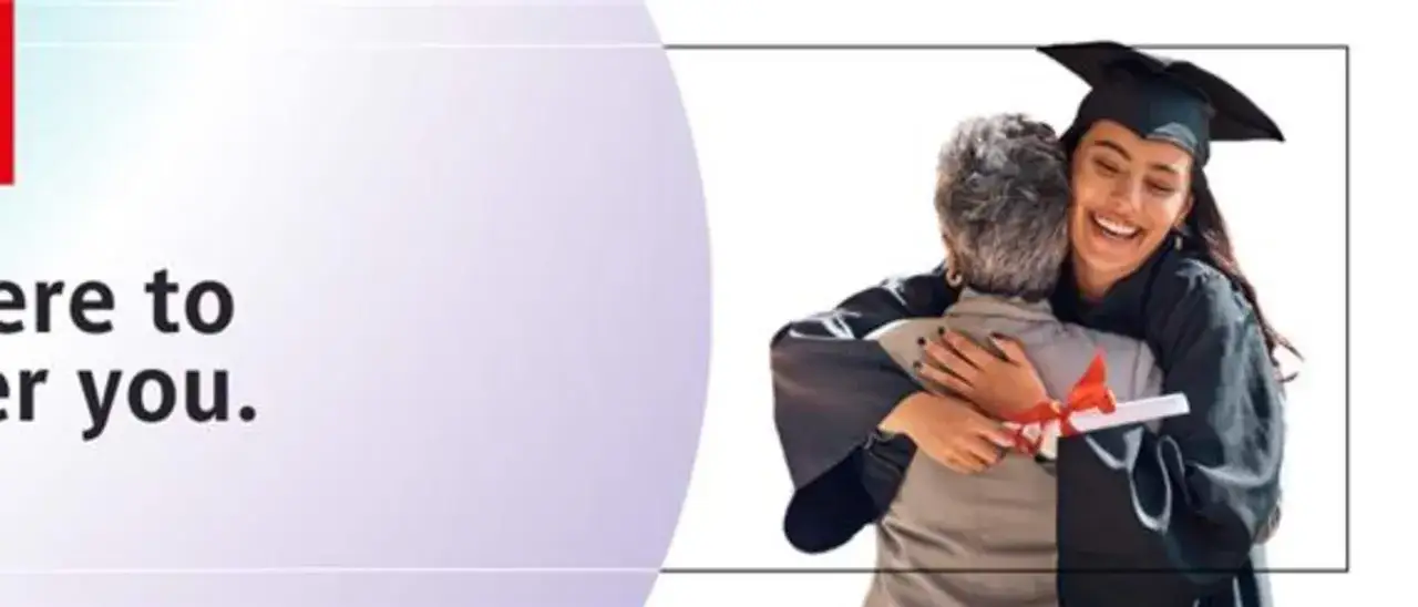 A graduate in a cap and gown hugs a loved one, diploma in hand. Pursue your dreams with an online masters in organizational leadership.