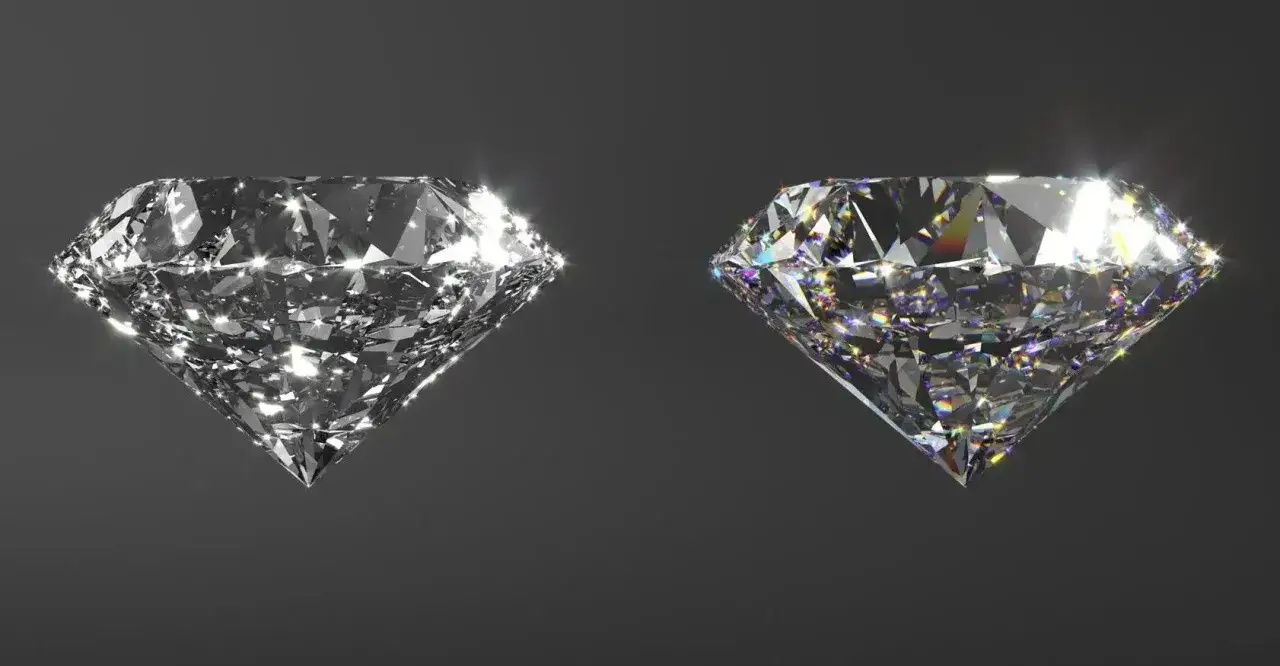 Dos diamantes, uno blanco y otro con destellos de colores, flotan sobre fondo gris. ¿Cómo saber si un diamante es verdadero?