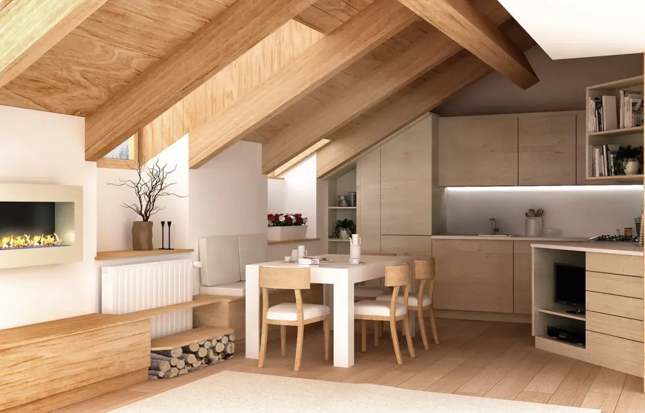 Accogliente mansarda casa con camino, cucina moderna e zona pranzo. Travi in legno a vista e arredi chiari creano un'atmosfera calda.