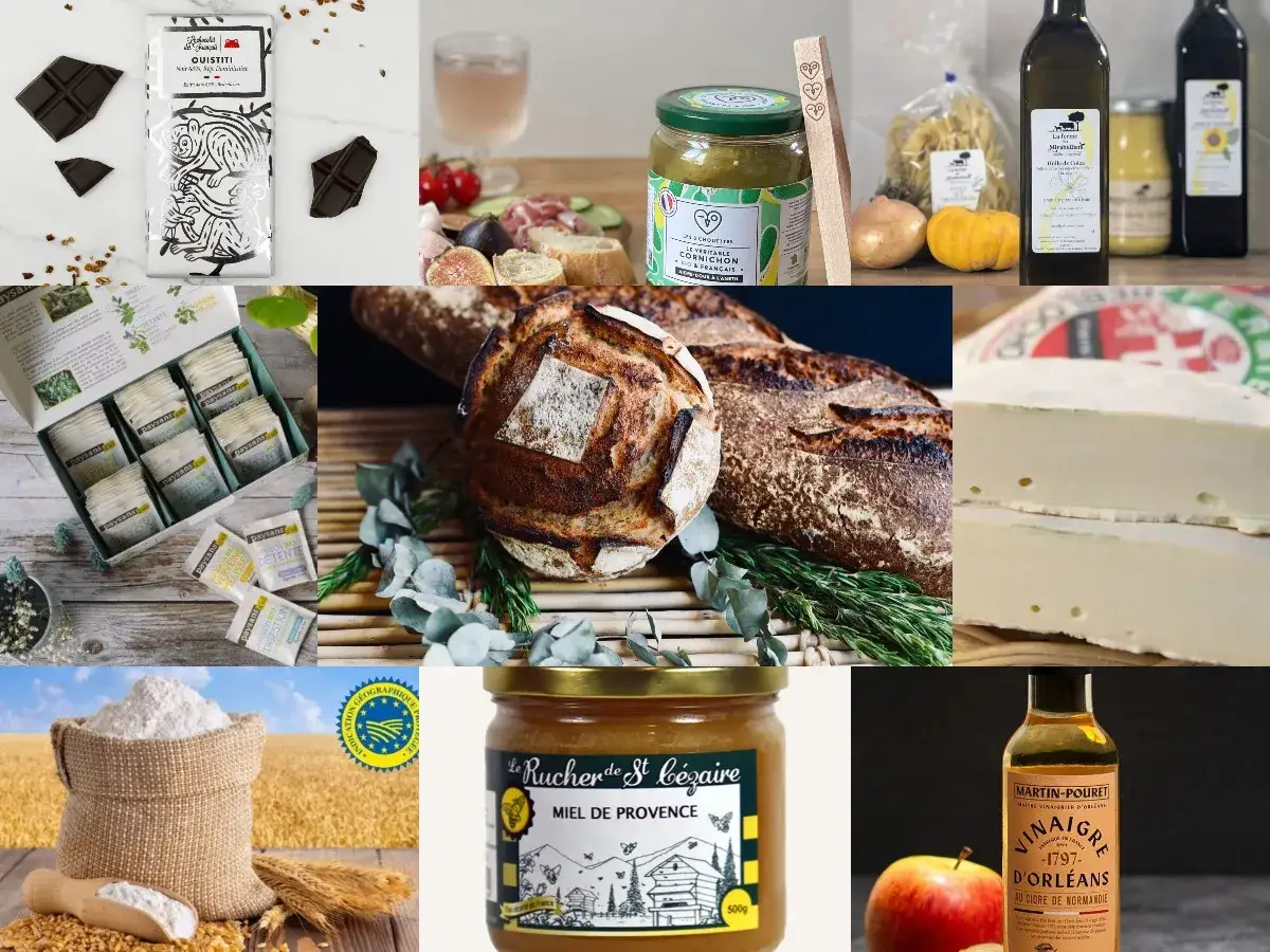 Assortiment de produits de luxe alimentaire : chocolat noir, pain artisanal, miel de Provence, vinaigre d'Orléans, fromage, tisanes, confiture de cornichons.