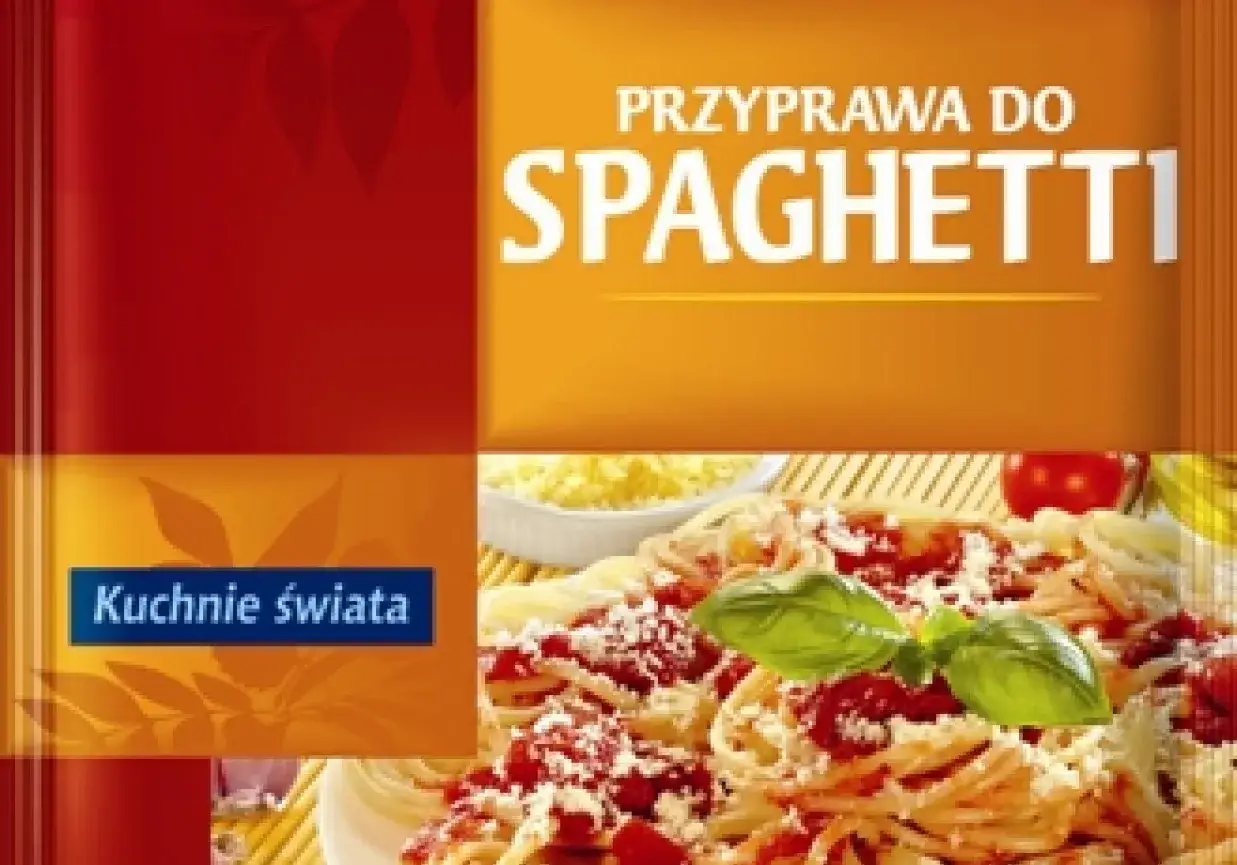 Gotowe jakie przyprawy do spaghetti? Na opakowaniu widnieje apetyczne danie z makaronem, pomidorami i bazylią.