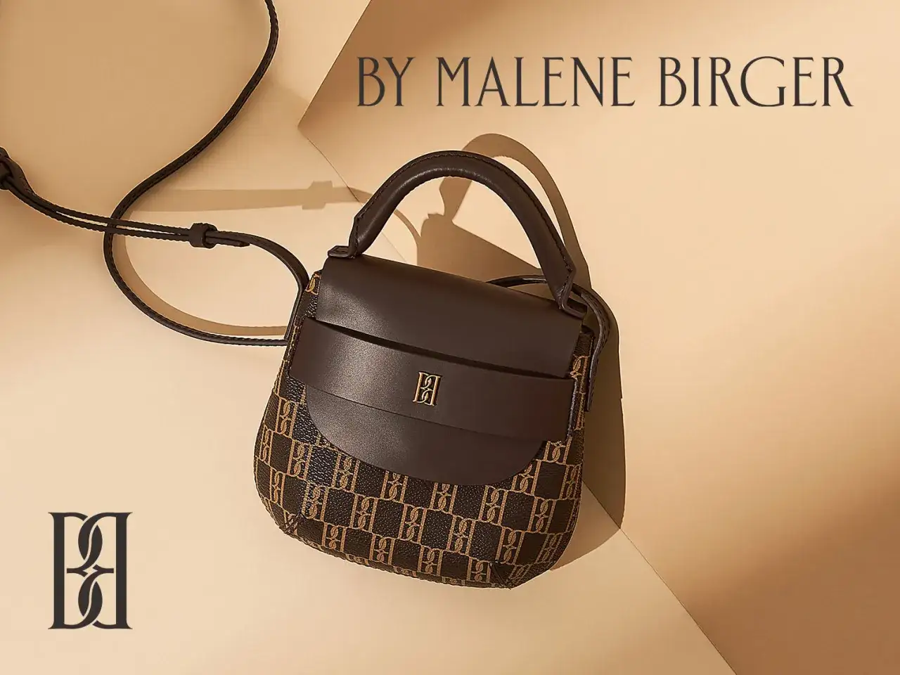 En elegant brun handväska från By Malene Birger, ett exempel på fina märkesväskor.