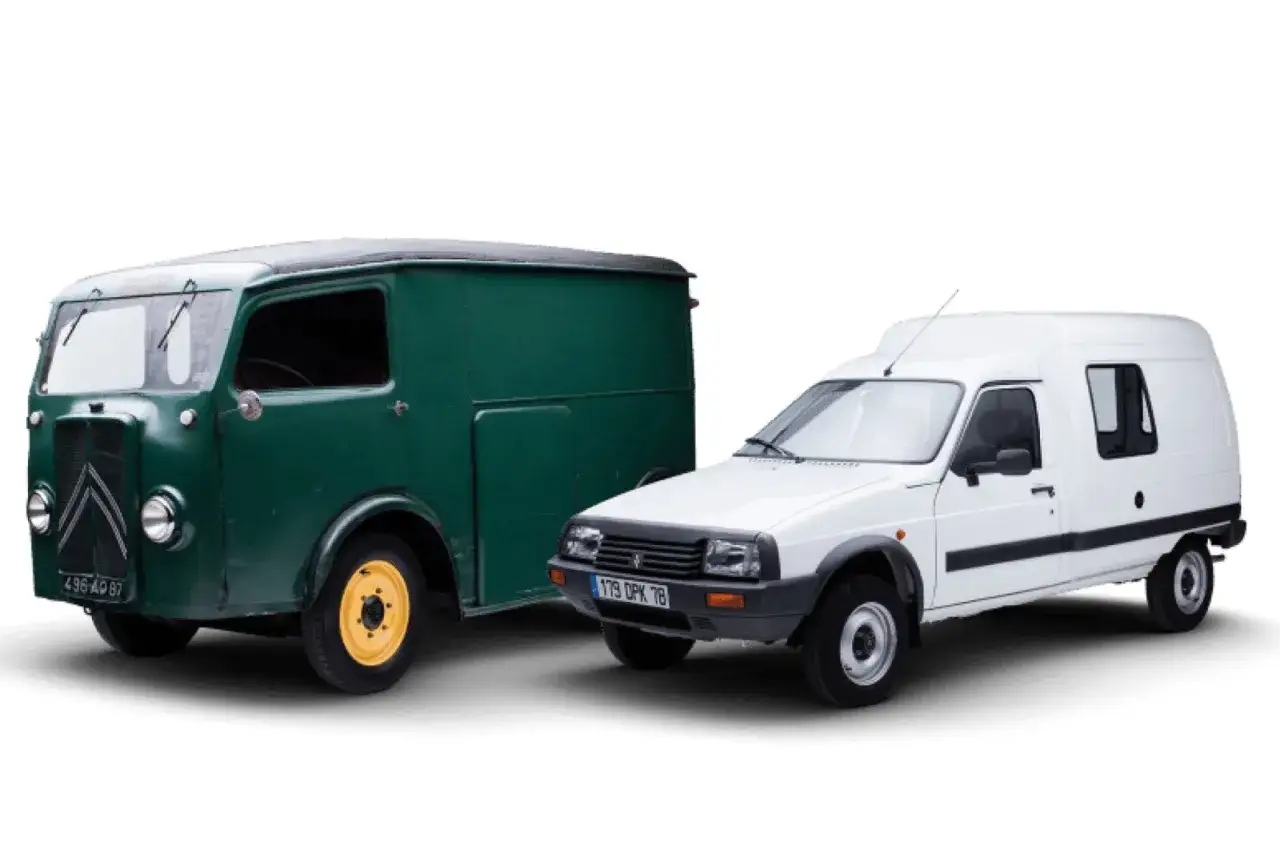 Zielony van obok białego Citroëna C15. Dwa samochody dostawcze, starszy i nowszy model.