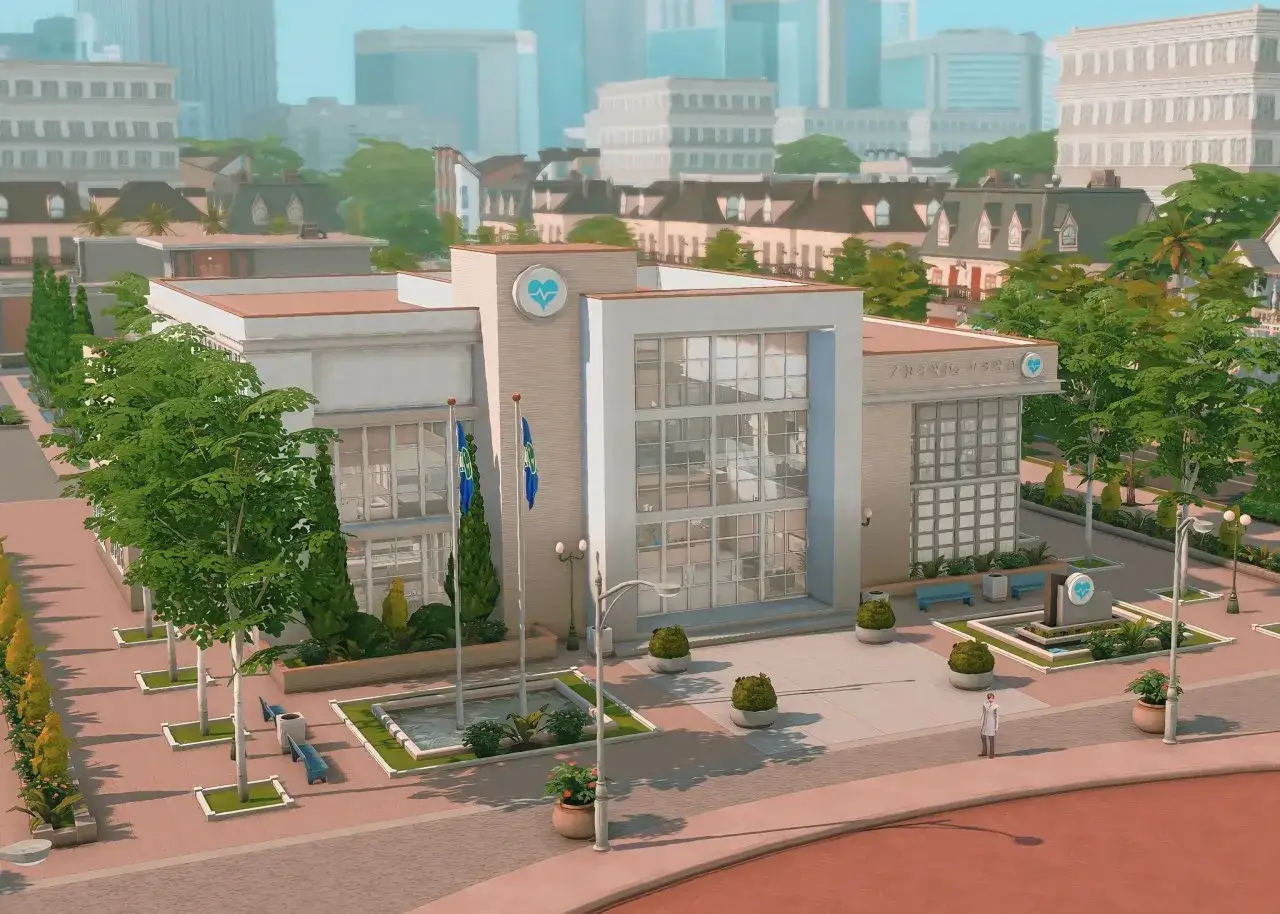 Nowoczesny szpital w The Sims 4, z zielenią i fontanną przed wejściem.