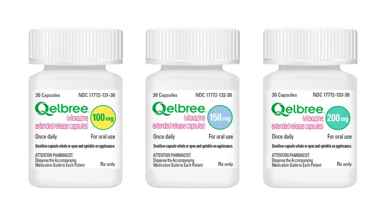 Trzy opakowania leków na ADHD: Qelbree (wiloxazyna) w dawkach 100 mg, 150 mg i 200 mg.