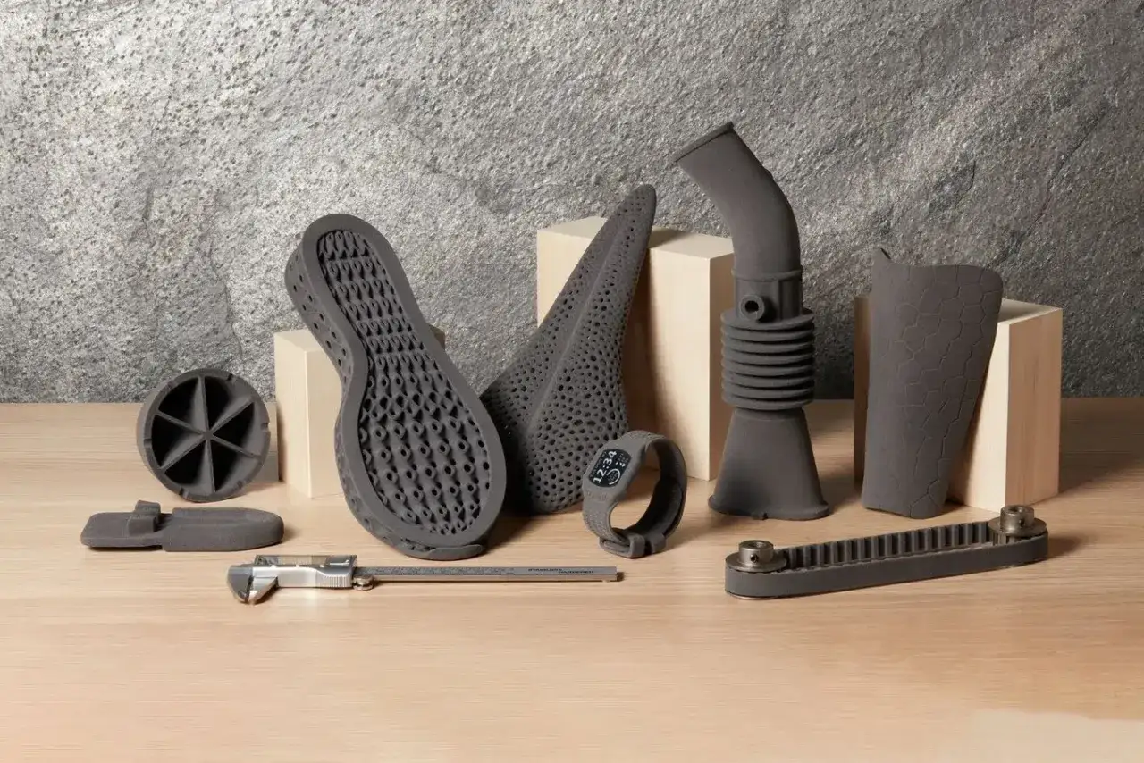 SLS TPU 3D printed objects, including a shoe sole, a fan, a wearable device, and industrial parts, showcase the material's versatility.