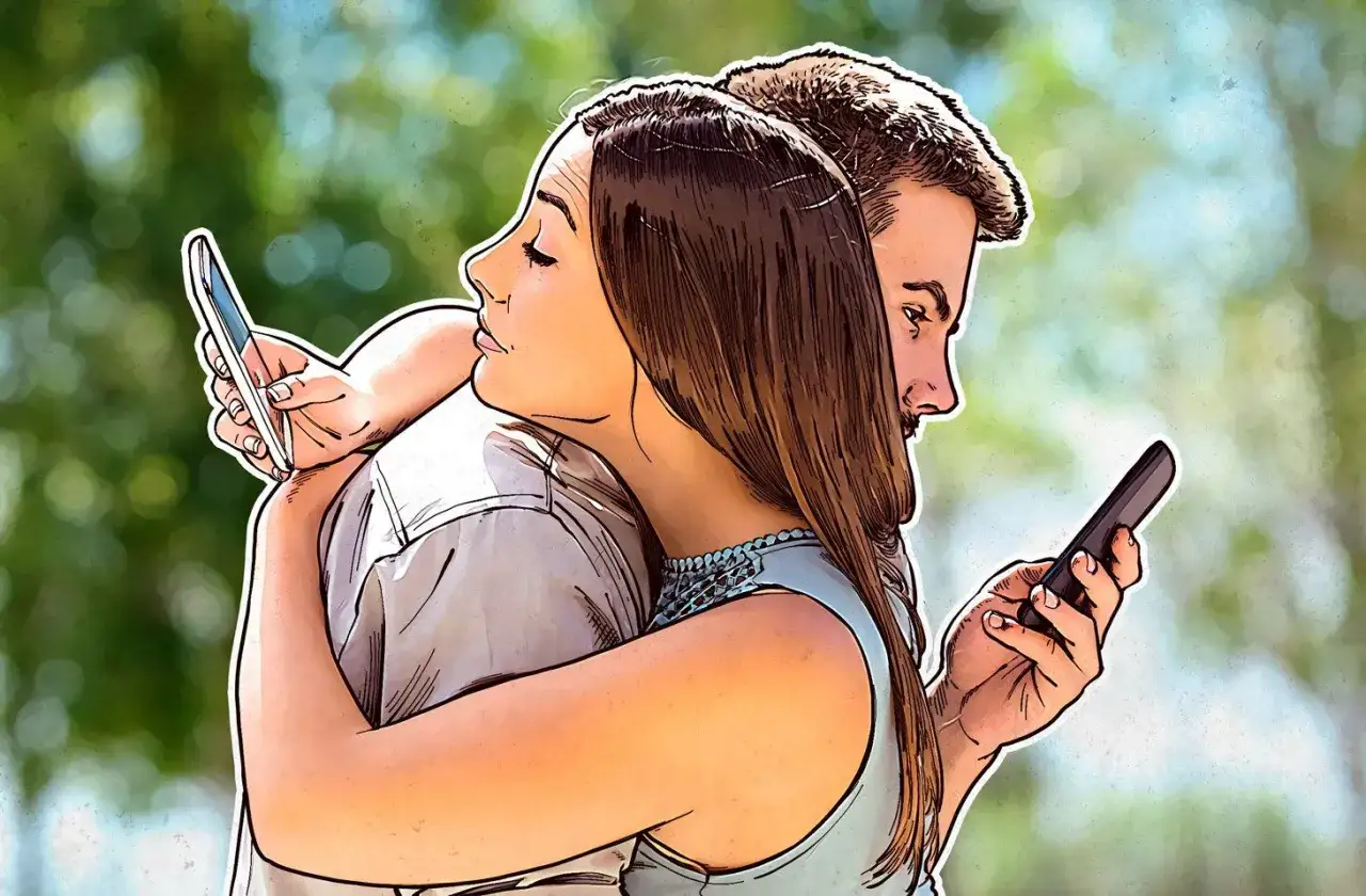 Para przytulająca się, ale każdy patrzy w sw&oacute;j telefon. Facet nie chce pokazać telefonu, co sugeruje ukrywanie czegoś.