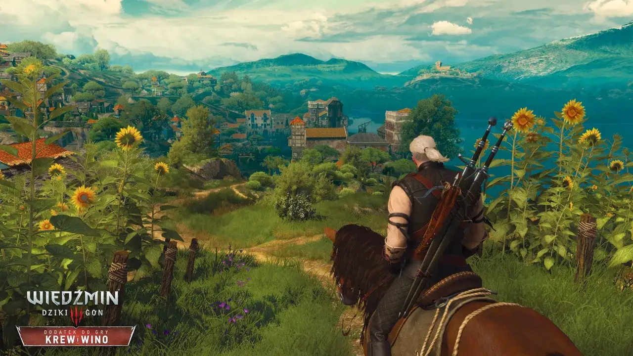 Geralt na koniu podziwia malowniczy krajobraz Toussaint, pełen słoneczników i urokliwych wiosek. To świat z Wiedźmin 3 Krew i Wino.