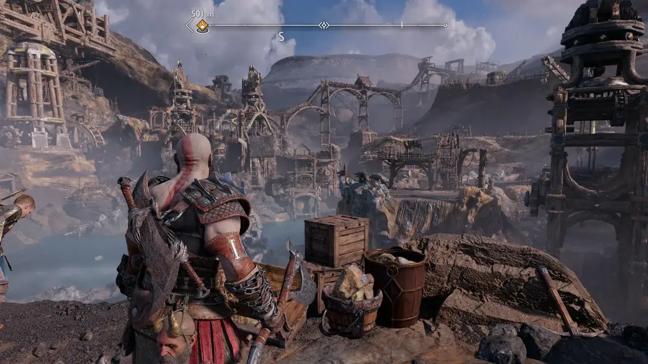 Kratos observa un paisaje industrial en God of War Ragnarök. El dios de la guerra se prepara para la batalla.