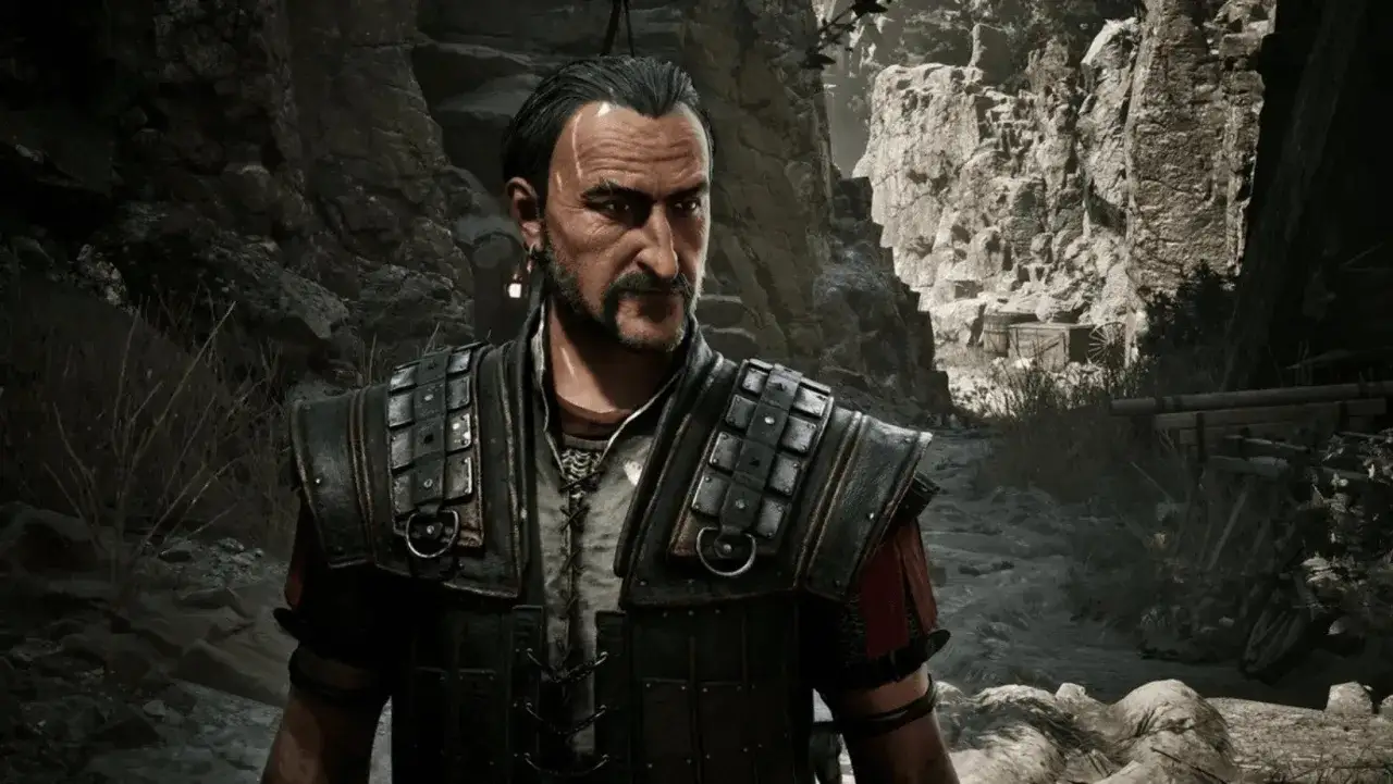 Postać z gry Gothic 1 Remake w zbroi, na tle skalistego krajobrazu.