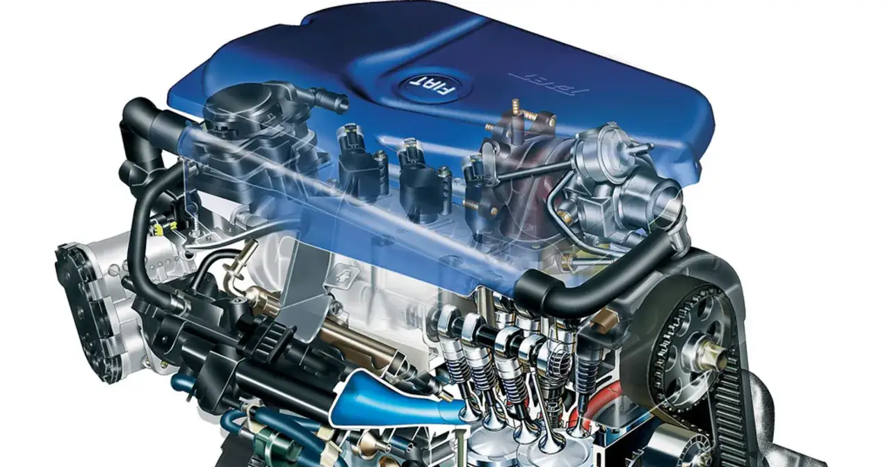 Silnik 1.4 t jet z widocznymi wtryskiwaczami, zaworami i turbosprężarką.