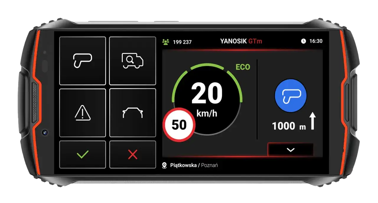 Na ekranie urządzenia widać interfejs aplikacji janosik. Wyświetla prędkość 20 km/h, ograniczenie do 50 km/h, ikonki ostrzeżeń i nawigacji.