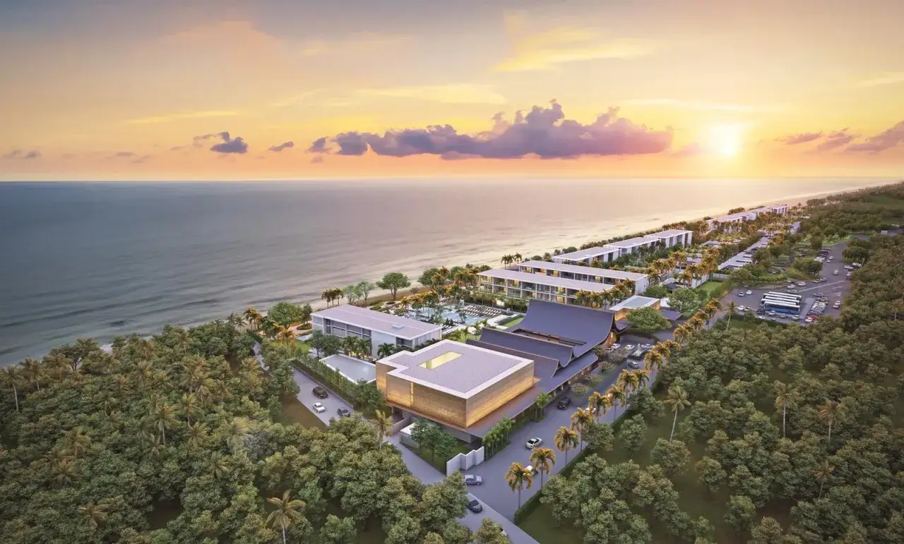 Nowoczesny kompleks apartamentów przy plaży w Tajlandii. Zastanawiasz się, ile kosztuje apartament w Tajlandii? Ten widok może pomóc w podjęciu decyzji.