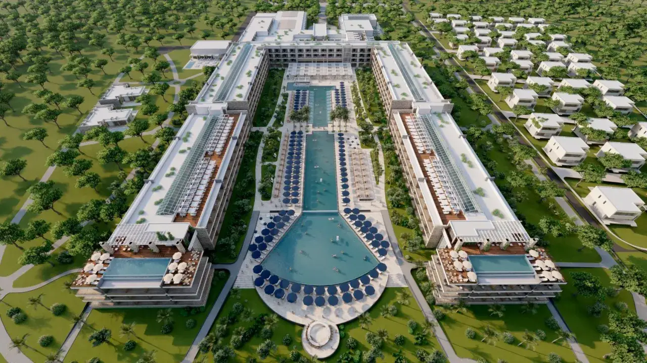 Nowoczesny albania hotel durres z basenami, leżakami i willami otoczony zielenią.