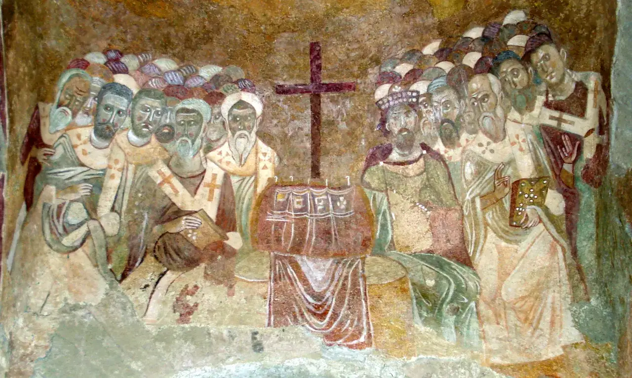 Fresk przedstawia zgromadzenie świętych i apostołów, symbolizujących dogmaty wiary katolickiej, z krzyżem pośrodku.
